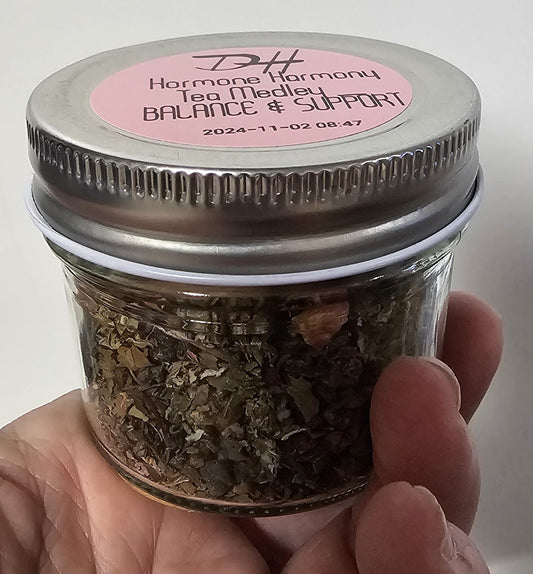 Hormone Harmony Tea Medley glass jar with organic loose leaf herb blend for hormone balancing and support